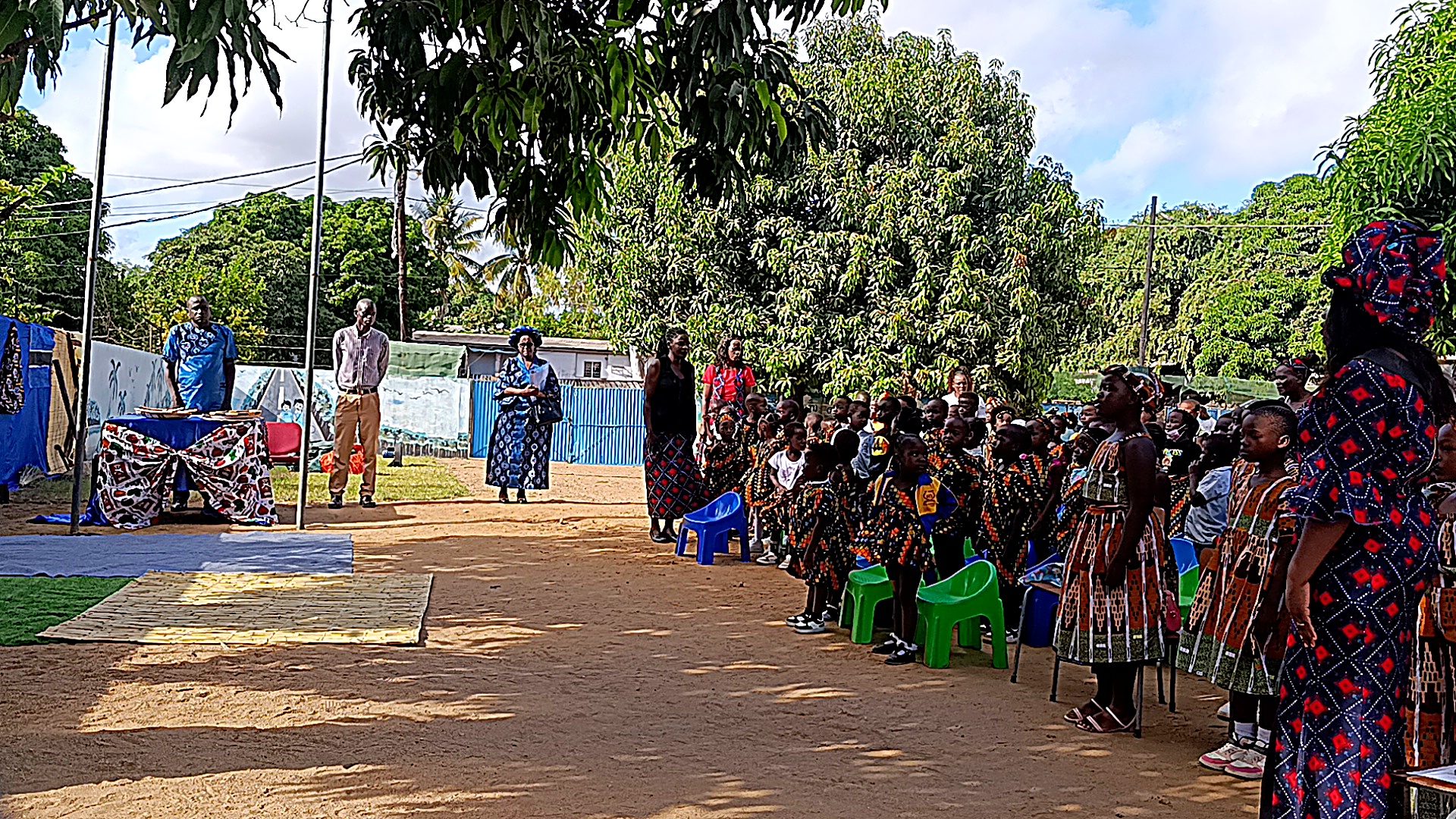 Learners gathered outdoors for a school assembly at On Point Education Centre