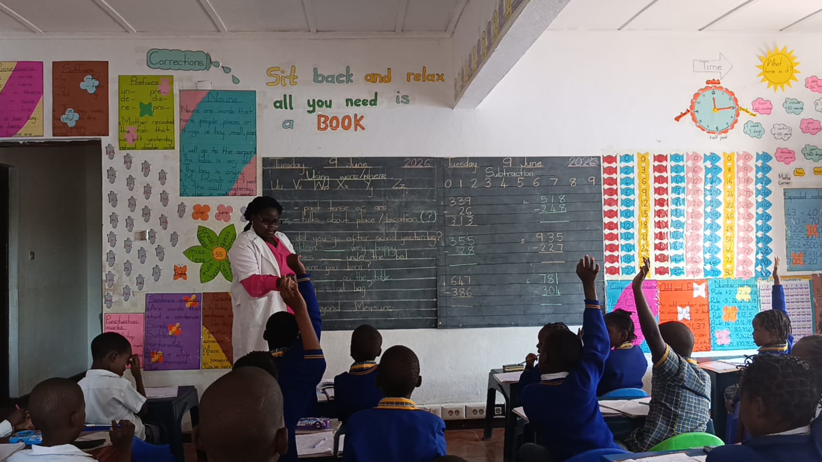 An On Point teacher working with learners in the classroom